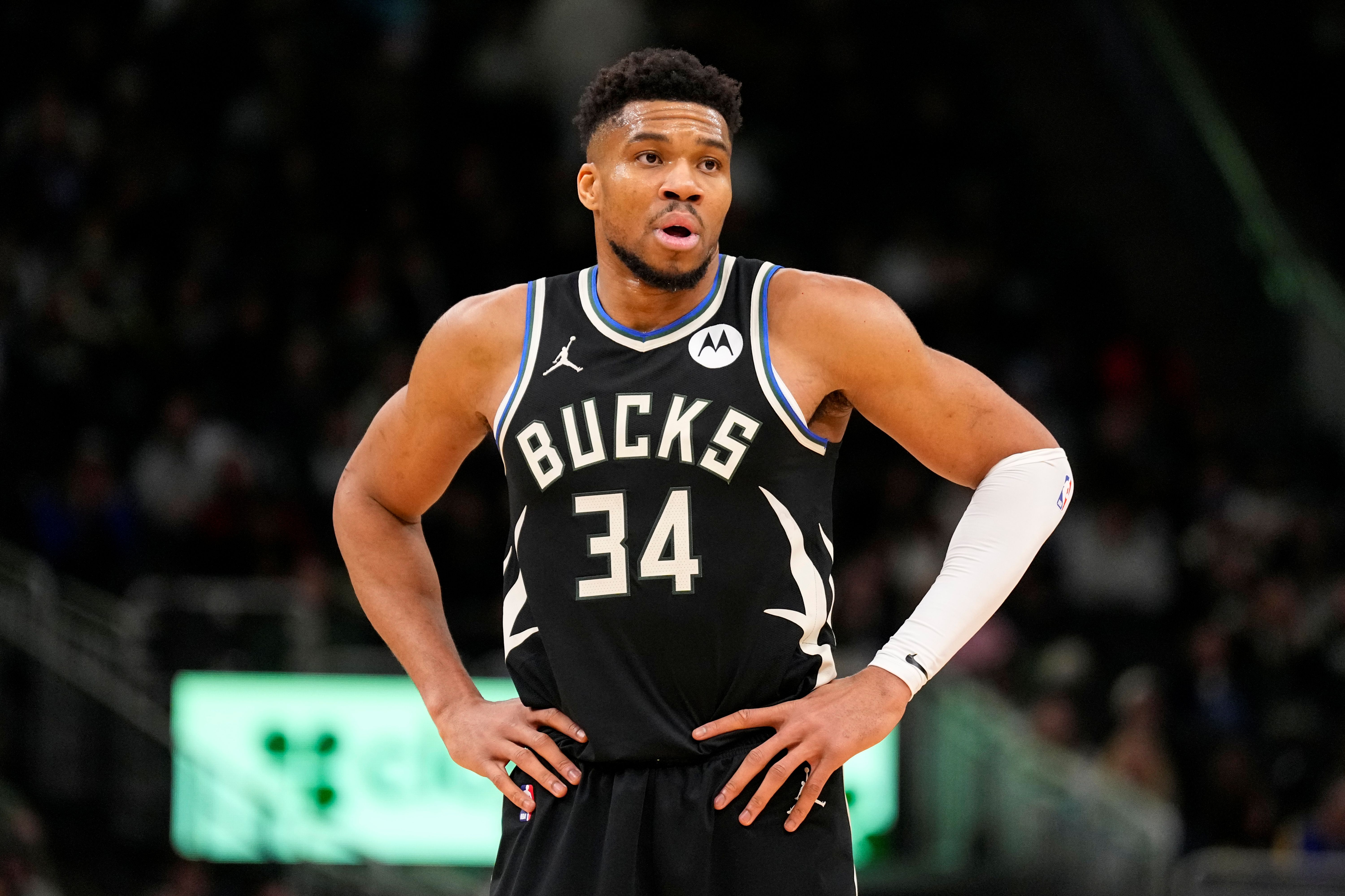 Milwaukee Bucks forward Giannis Antetokounmpo (34), seen here looking on during a game, is featured in our Celtics vs. Bucks player props today.
