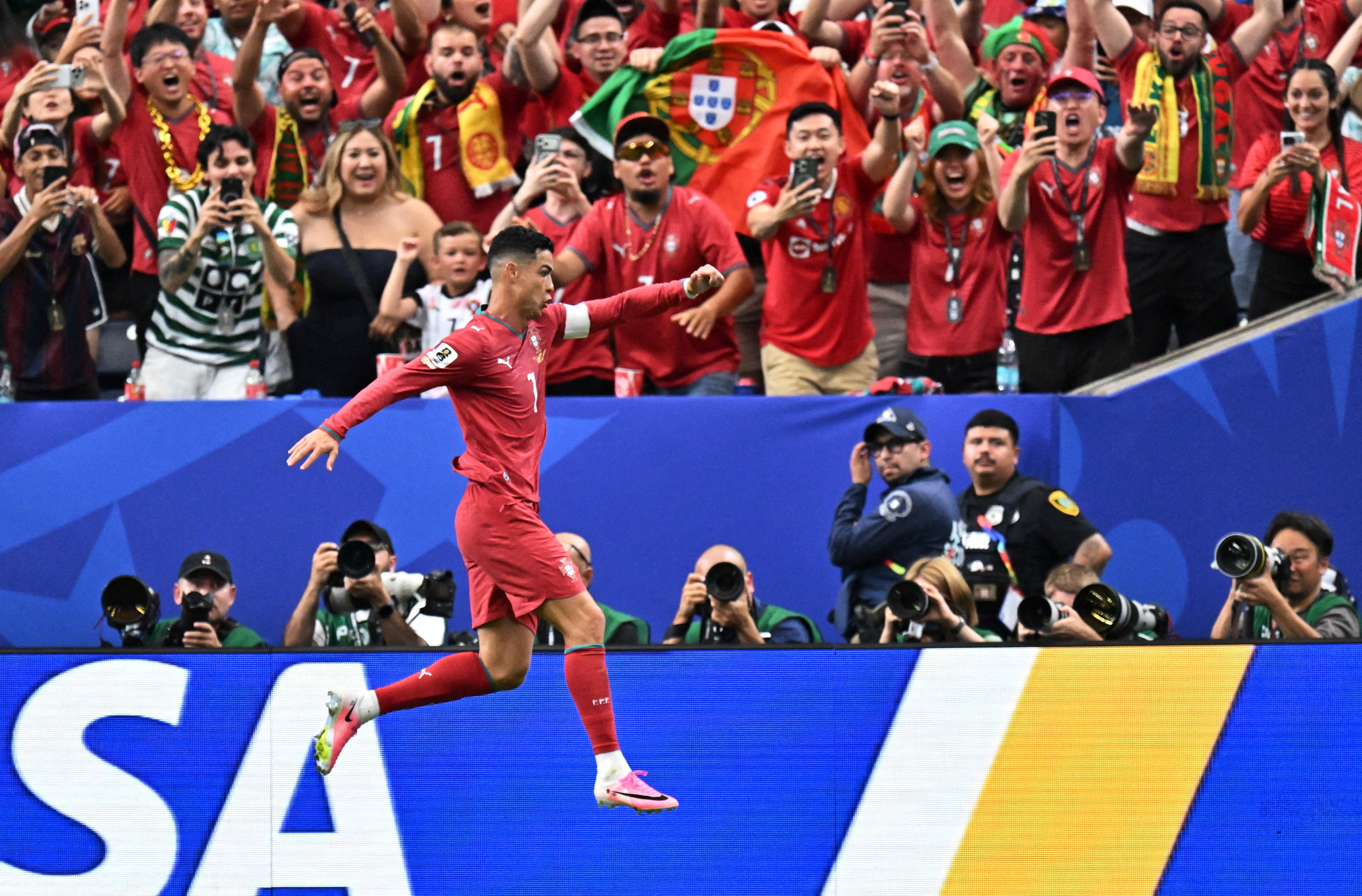 Portugal's Cristiano Ronaldo celebrates scoring their third goal as he is featured in our Colombia vs. Portugal prediction.