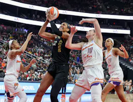 A'ja Wilson (22) of the Las Vegas Aces shoots against Moriah Jefferson (8) and Megan Gustafson (10) of the Phoenix Mercury, as we offer our best Mercury vs. Aces predictions and expert picks for Tuesday's season opener in Las Vegas.