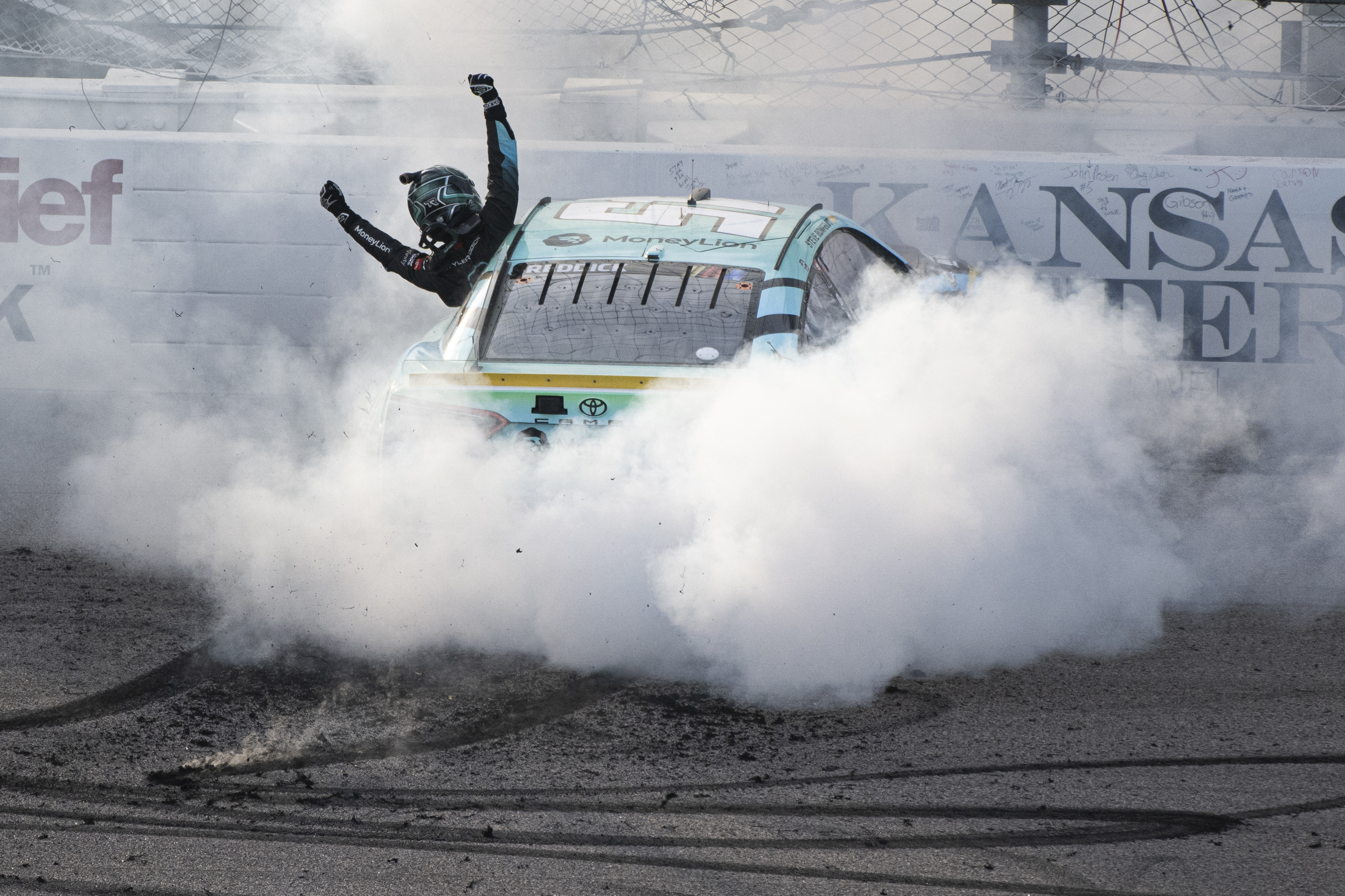 NASCAR Cup Series driver Tyler Reddick (45) celebrates winning the NASCAR Cup Series race at Kansas Speedway.