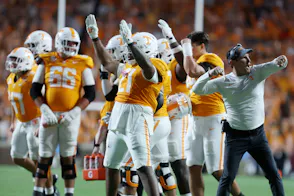 Tennessee Volunteers players and coaches react after a play under review was ruled a touchdown as we look at Bovada fines in the state.
