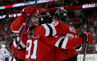 Dawson Mercer of the New Jersey Devils is congratulated as we look at the New Jersey sports betting financials for April 2024