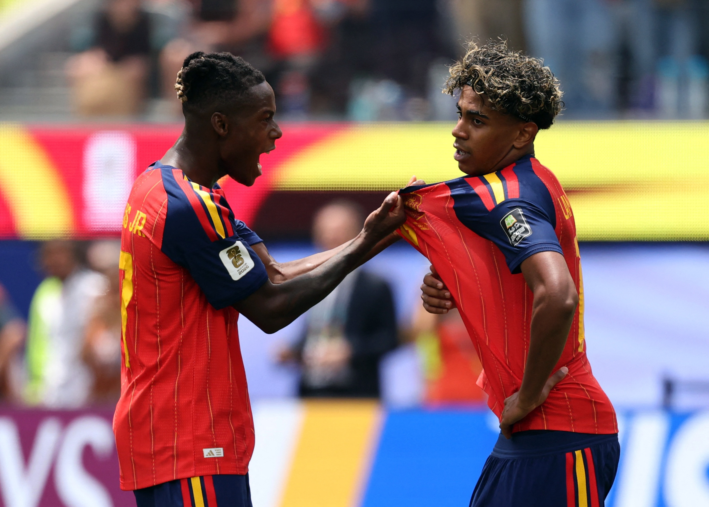 Spain's Nico Williams and Lamine Yamal celebrate after the match.