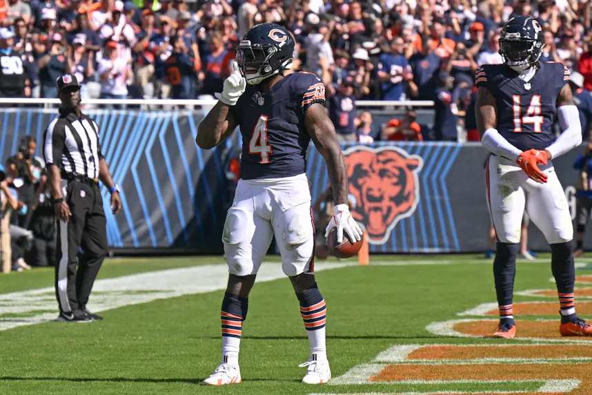 Chicago Bears running back D'Andre Swift celebrates his rushing touchdown as we look at our Jaguars vs. Bears Week 6 NFL early picks, predictions &odds for the tilt in London.