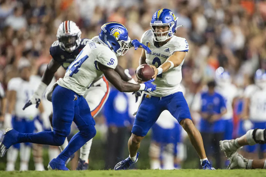 Quarterback Chevan Cordeiro #2 of the San Jose State Spartans looks the hand the ball off to running back Shamar Garrett #24 of the San Jose State Spartans during the first half of their game against the Auburn Tigers at Jordan-Hare Stadium on Sept. 10.