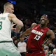 Bam Adebayo of the Miami Heat looks to go past Kristaps Porzingis of the Boston Celtics during the first quarter of game one of the Eastern Conference First Round Playoffs. We're backing Adebayo in our Celtics vs. Heat player props. 