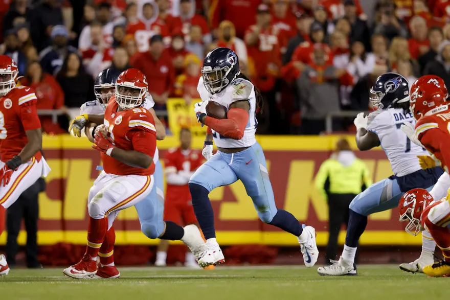 Derrick Henry of the Tennessee Titans runs the ball against the Kansas City Chiefs in the first quarter at Arrowhead Stadium on November 06, 2022 in Kansas City, Missouri.