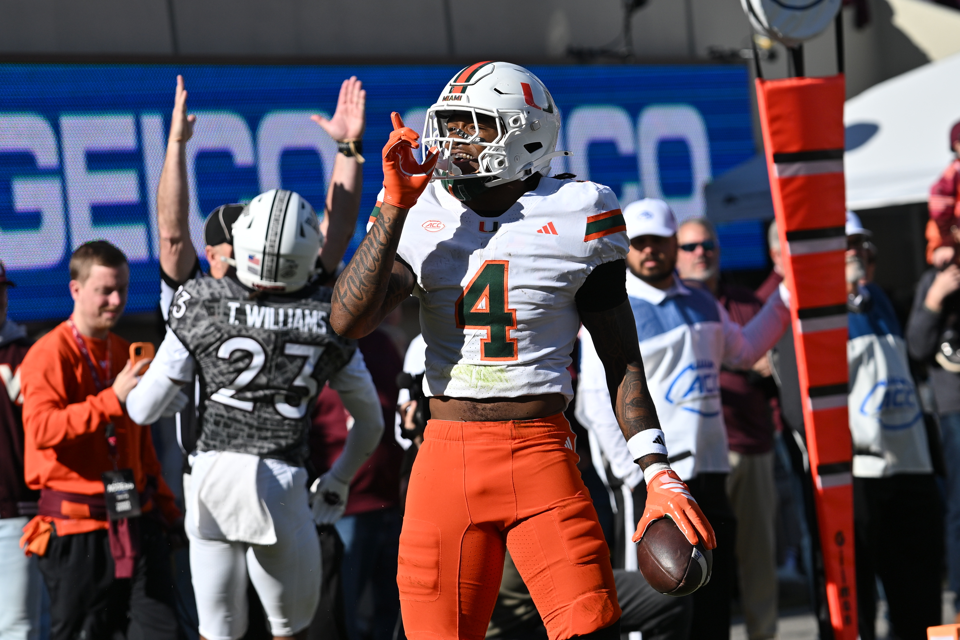 Hurricanes running back Mark Fletcher Jr. celebrates a touchdown as we make our best Miami vs. Texas A&M anytime touchdown scorer predictions