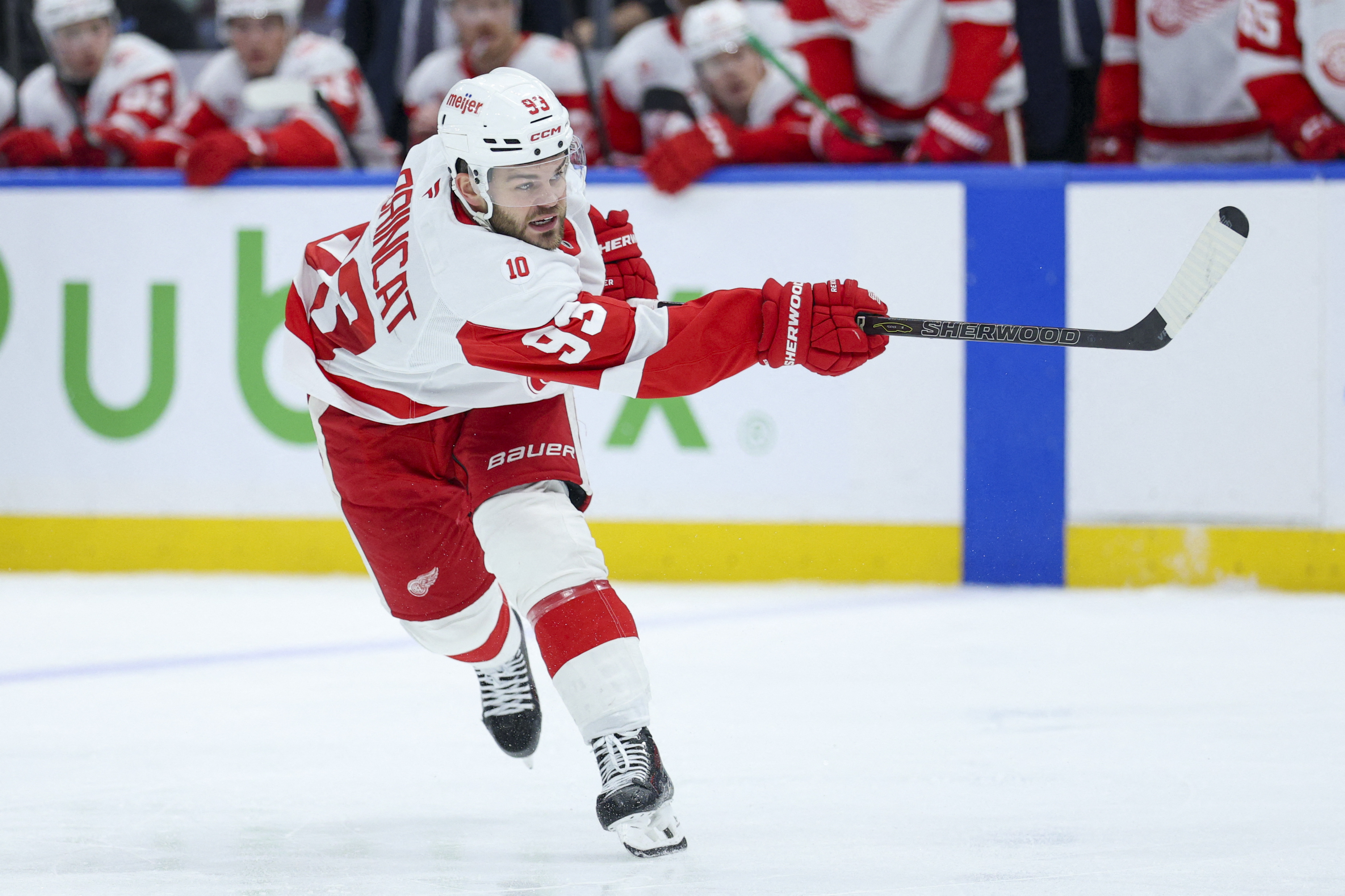 Detroit Red Wings Alex DeBrincat - who's featured in my best NHL player props - shoots the puck. 