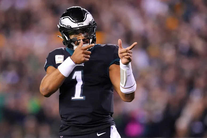 Jalen Hurts of the Philadelphia Eagles celebrates after a 4-yard rushing touchdown by Kenneth Gainwell during the first quarter against the Green Bay Packers, and we offer new U.S. bettors our exclusive Caesars promo code for Dolphins vs. Eagles.