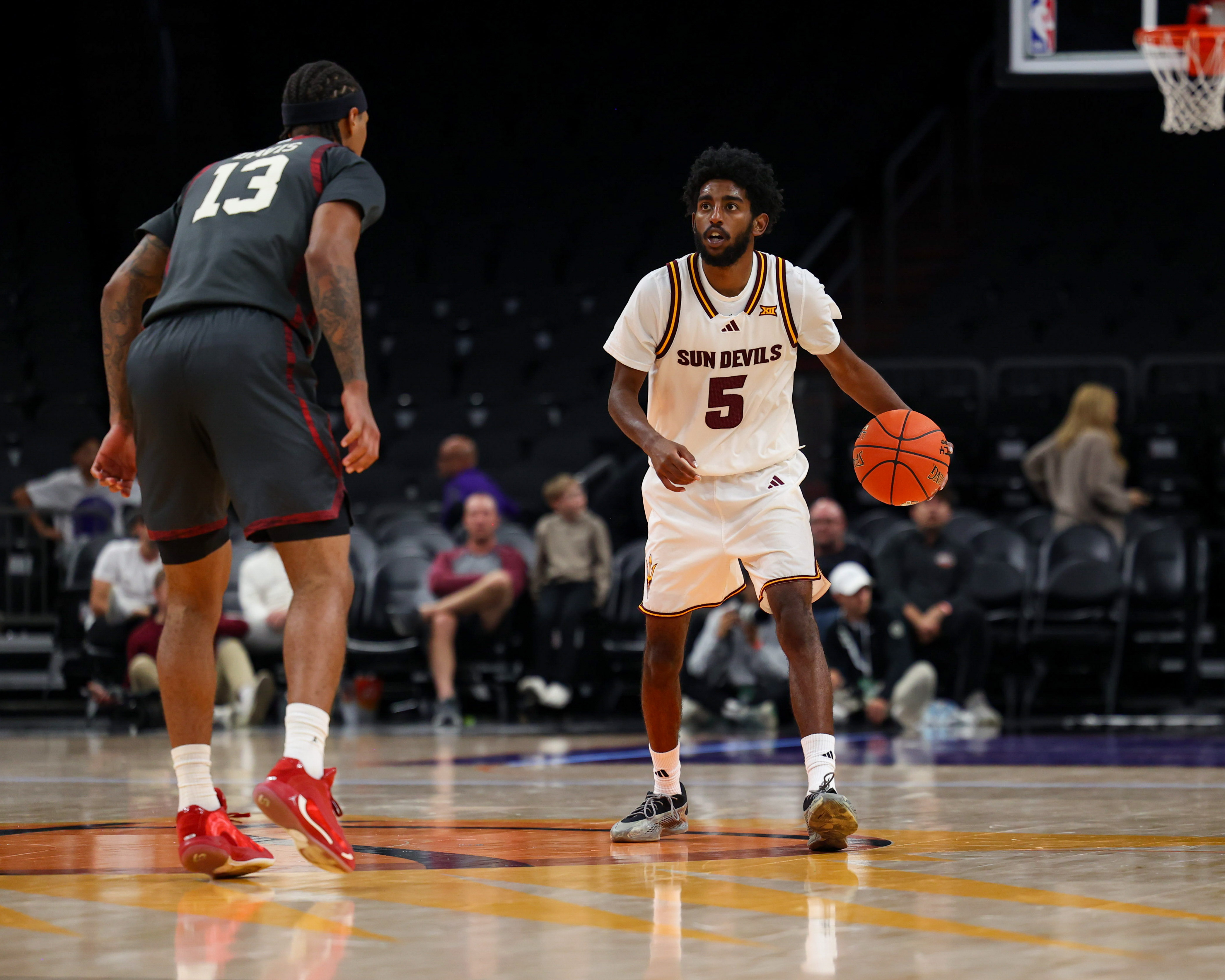 Arizona State University Sun Devils guard Moe Odum dribbles down court as we make our college basketball best bets.