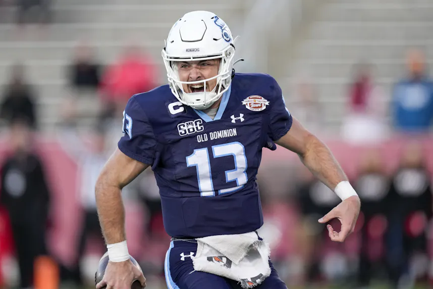 Old Dominion Monarchs quarterback Grant Wilson celebrates his scoring run as we look at the Virginia sports betting financials for May 2024