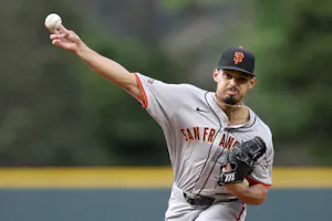 Jordan Hicks of the San Francisco Giants throws against the Colorado Rockies, and we offer our top MLB player props and expert picks based on the best MLB odds.