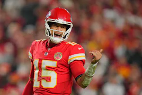 Kansas City Chiefs quarterback Patrick Mahomes - who's featured in our NFL expert picks for Week 9 - calls a huddle.