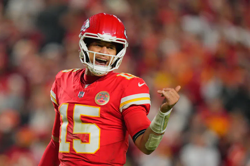 Kansas City Chiefs quarterback Patrick Mahomes - who's featured in our NFL expert picks for Week 9 - calls a huddle.