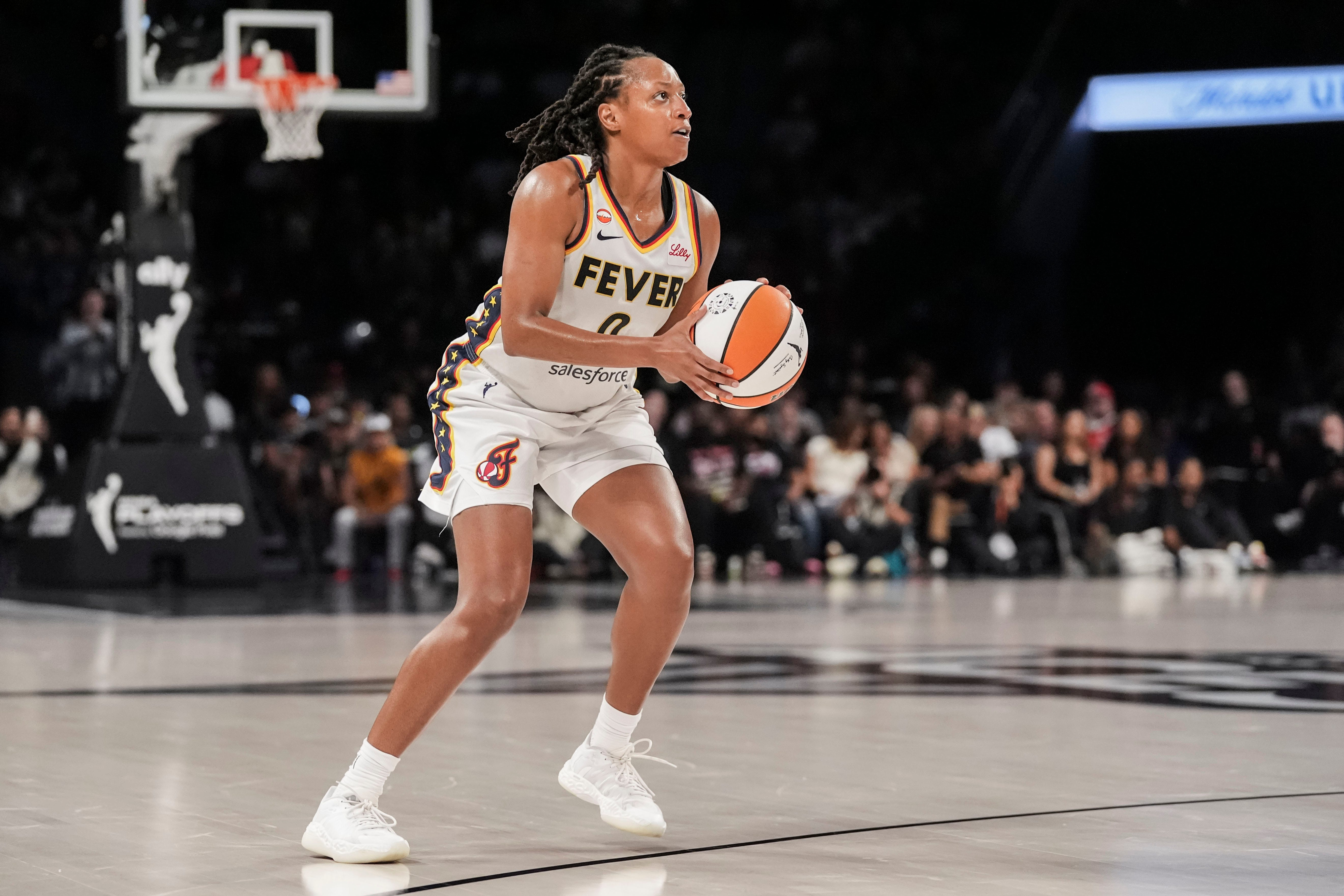 Indiana Fever guard Kelsey Mitchell looks to attempt a basket as we make our best Aces vs. Fever prediction for Game 2.