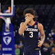 Jaylin Stewart #3 of the Connecticut Huskies reacts as we look at the latest 2024 March Madness odds ahead of the NCAA Tournament.