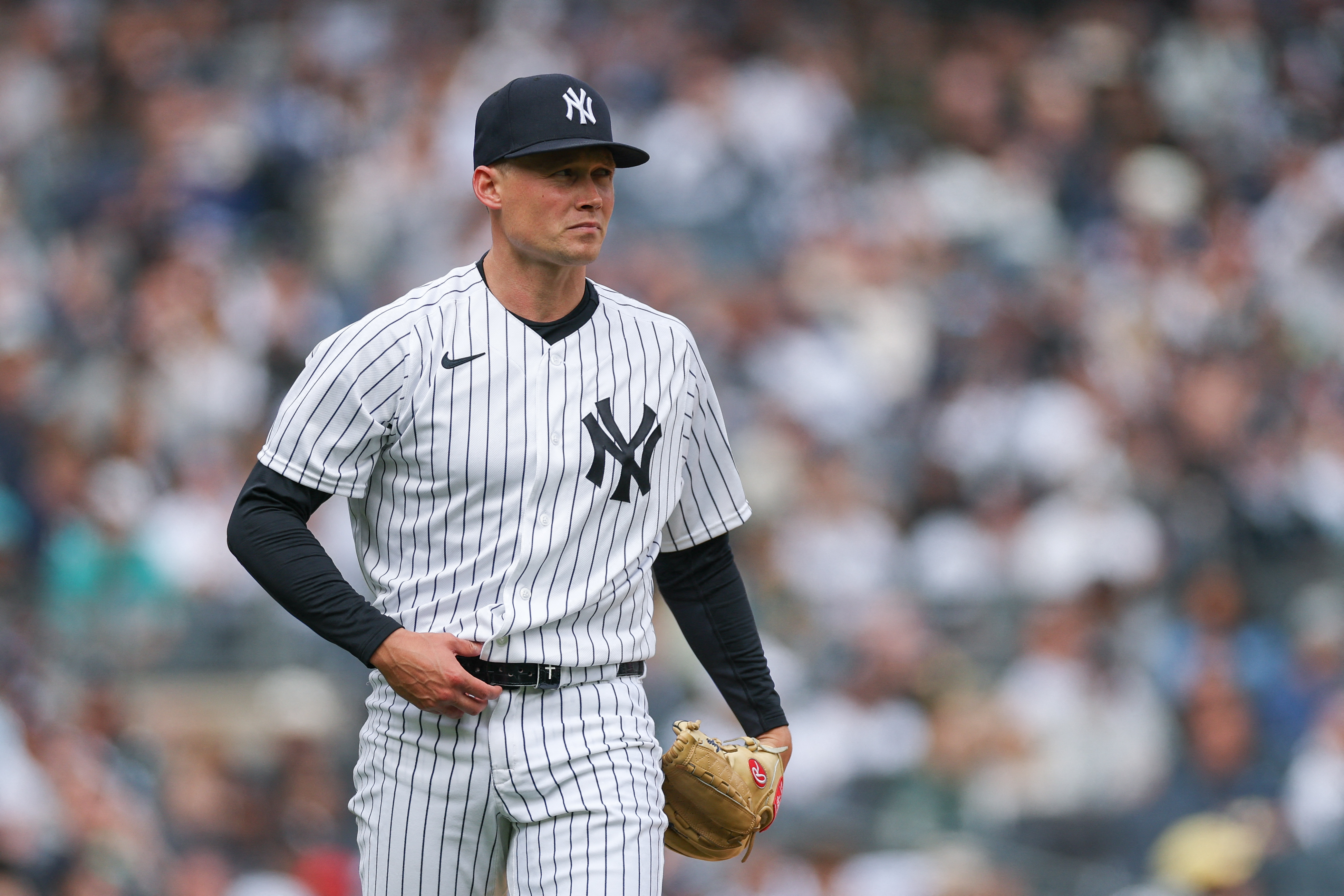 New York Yankees pitcher Will Warren (29), seen here looking back during a game, is featured in our Rangers vs. Yankees prediction tonight.