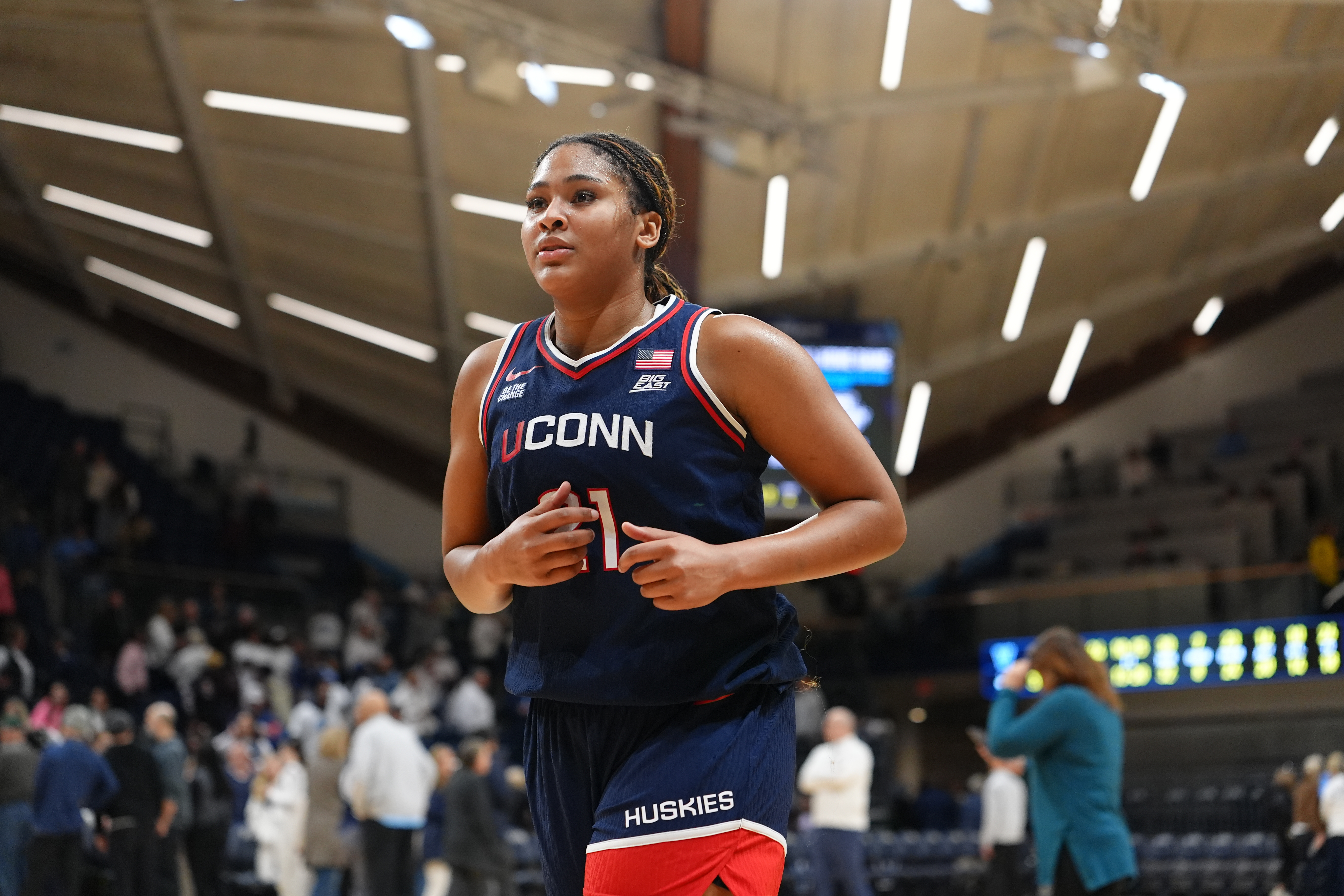 UConn forward Sarah Strong (21), seen here looking on after a game, is featured in our UTSA vs. UConn prediction today.