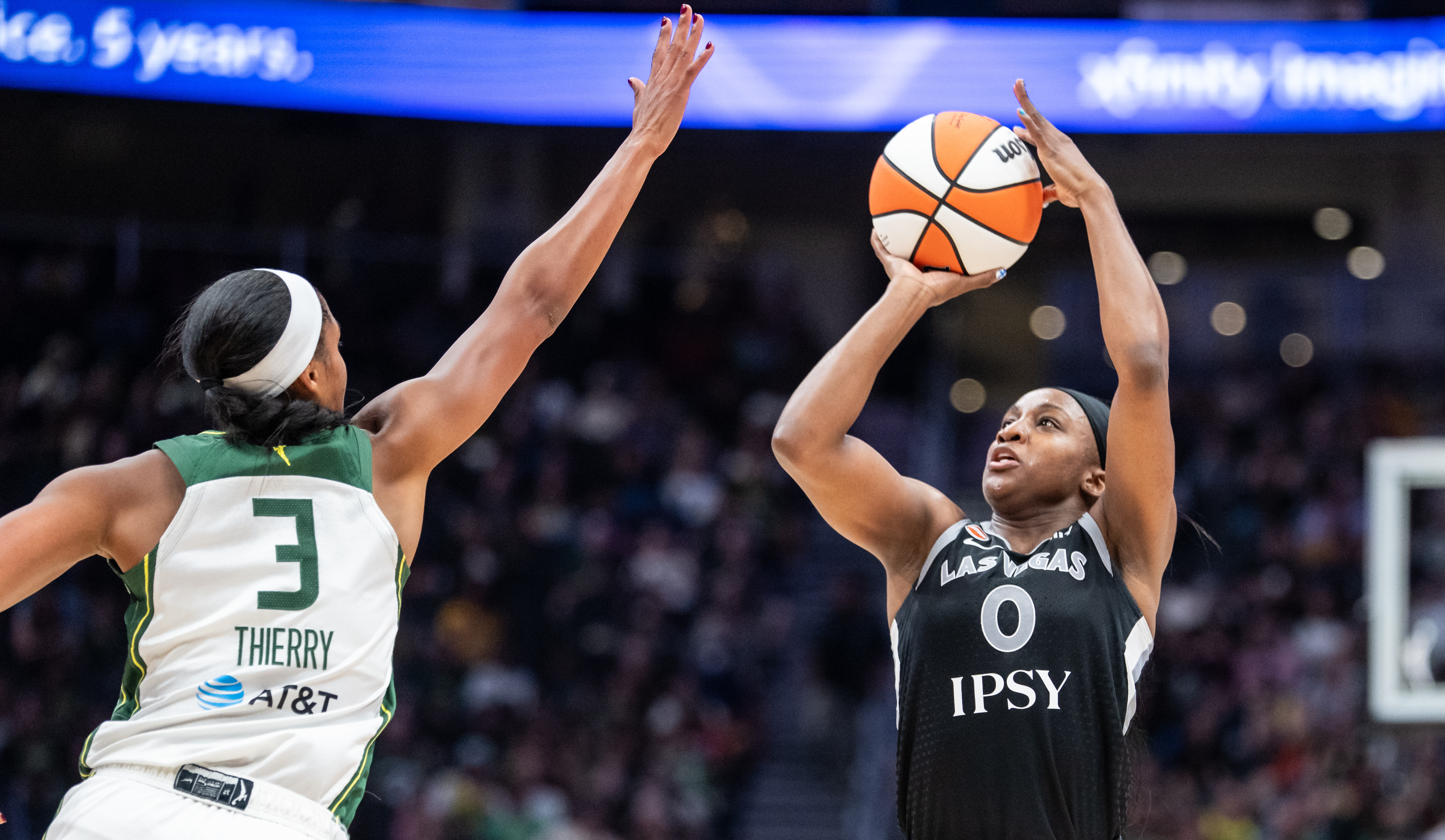  Aces guard Jackie Young (0) attempts a three-point shot as we break down our Fever vs. Aces prediction.