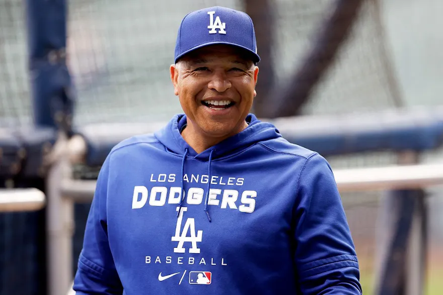 Manager Dave Roberts of the Los Angeles Dodgers walks on the field before the start of the game against the Milwaukee Brewers. Photo by John Fisher/Getty Images via AFP.
