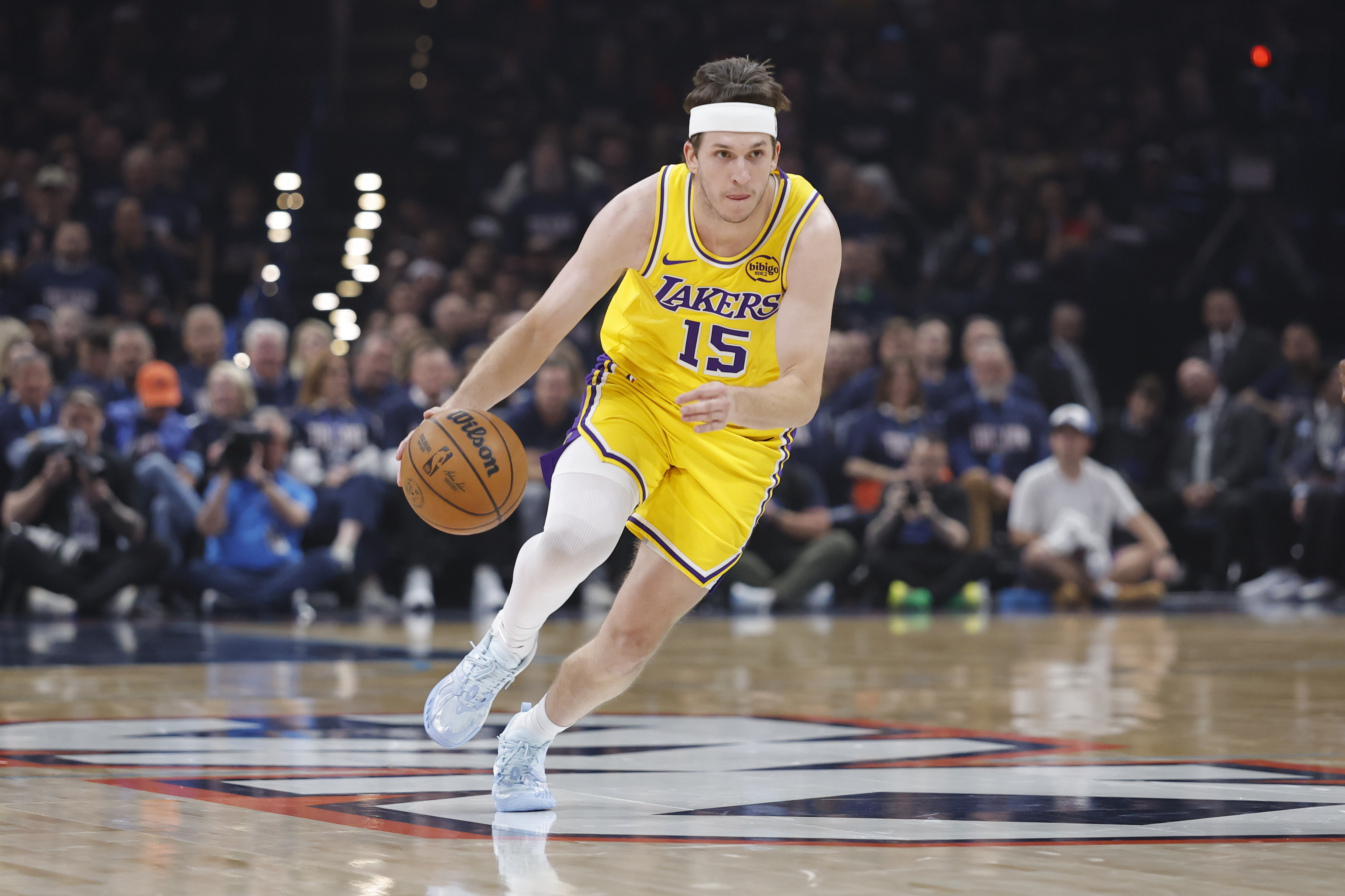 Los Angeles Lakers guard Austin Reaves (15) dribbles down the court as we break down our NBA Play of the Day.