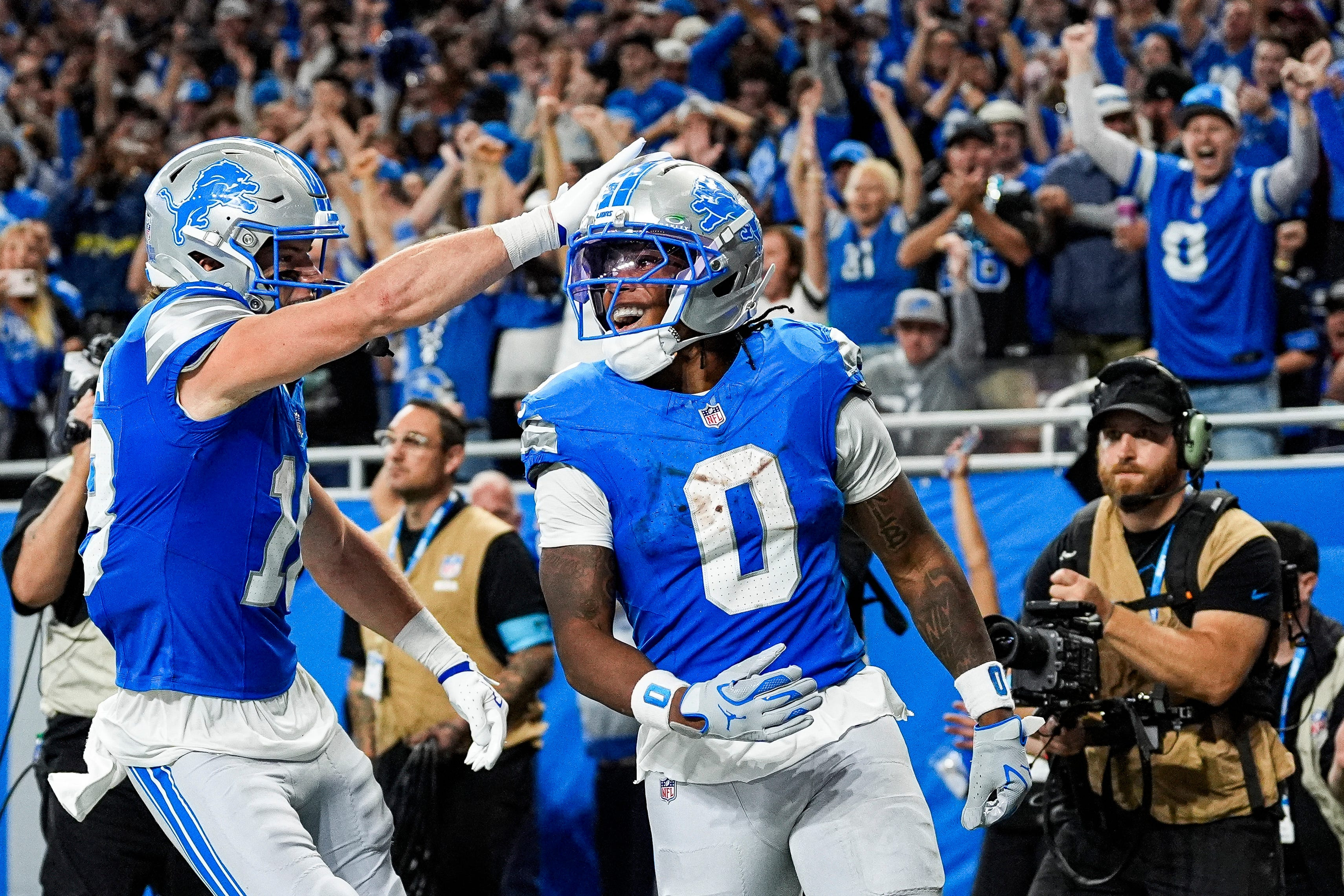 Detroit Lions running back Jahmyr Gibbs (0) celebrates a touchdown as we offer our Lions vs. Cardinals prediction.
