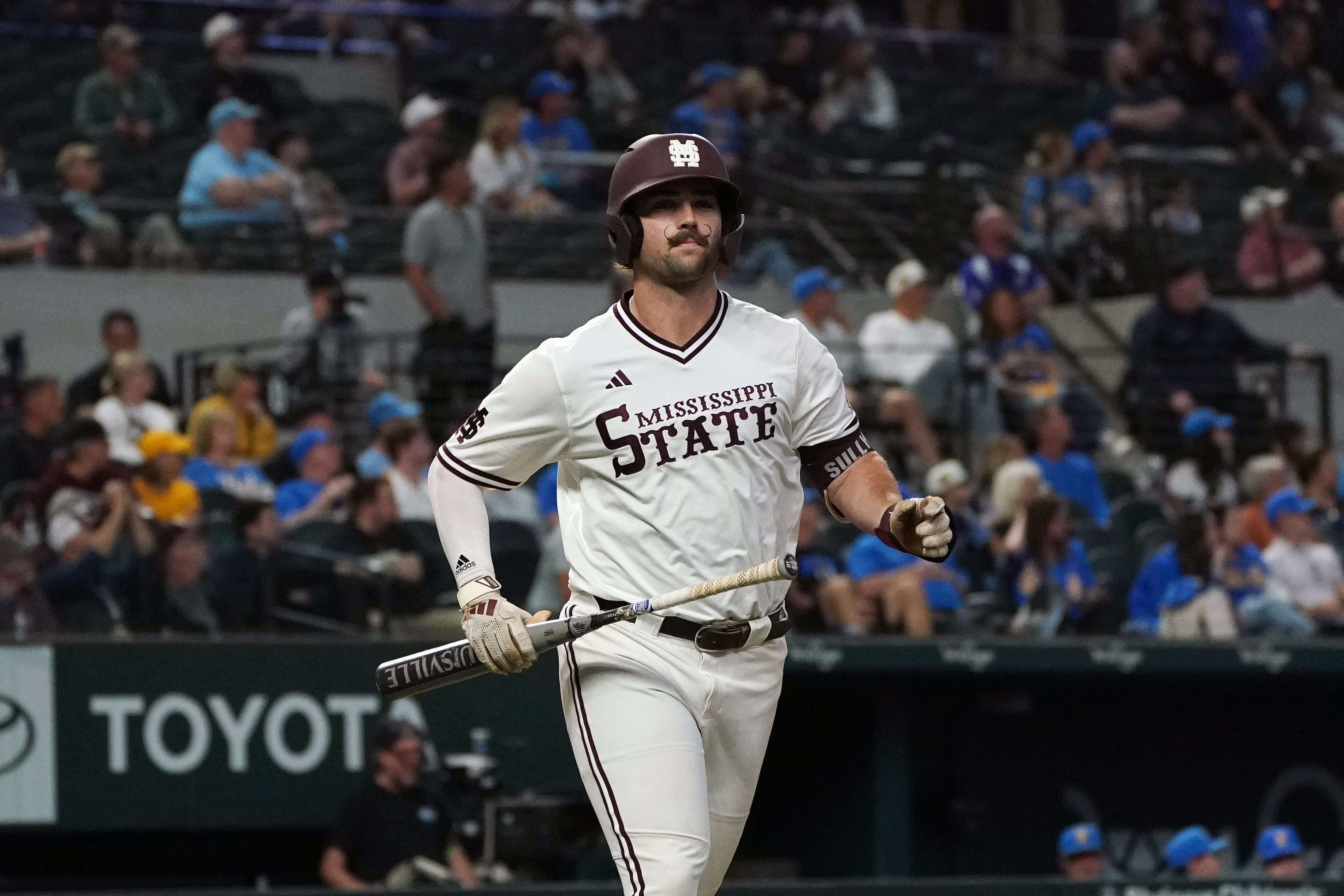 A Mississippi State Bulldogs player walks off the field as we look at the state of the recent mobile sports betting bill, including a tax break for casinos. 