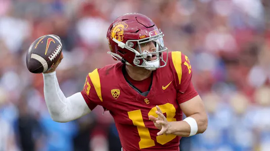 Caleb Williams of the USC Trojans passes the ball during the first half of a game against the UCLA Bruins at United Airlines Field. We asked ChatGPT to make a 2024 NFL Draft mock draft and it had Williams go No. 1 overall.