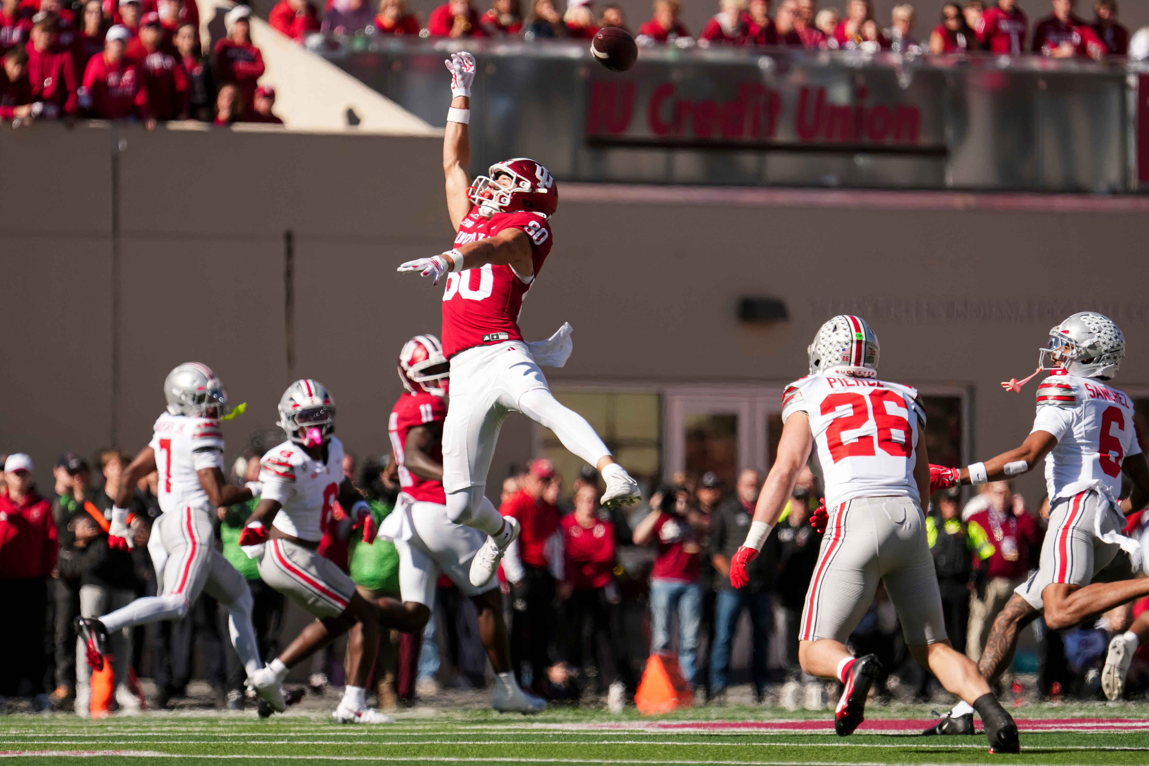  Indiana Hoosiers wide receiver Charlie Becker (80) reaches for a high pass as he is featured in our Indiana vs. Michigan same-game parlay for Week 8.