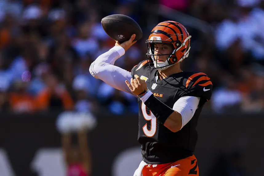 Cincinnati Bengals quarterback Joe Burrow throws a pass against the Baltimore Ravens as we offer our Week 6 ATS picks for every game.