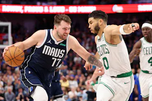 Dallas Mavericks guard Luka Doncic dribbles the ball against Boston Celtics forward Jayson Tatum during the fourth quarter of Game 3 of the 2024 NBA Finals at American Airlines Center. We're backing Doncic in our Celtics vs. Mavericks Player Props.