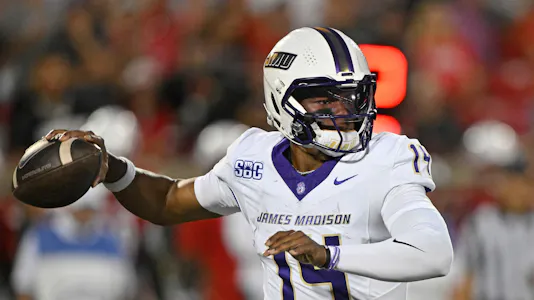 Dukes quarterback Alonza Barnett III looks to pass as we make our best James Madison vs. Texas State prediction