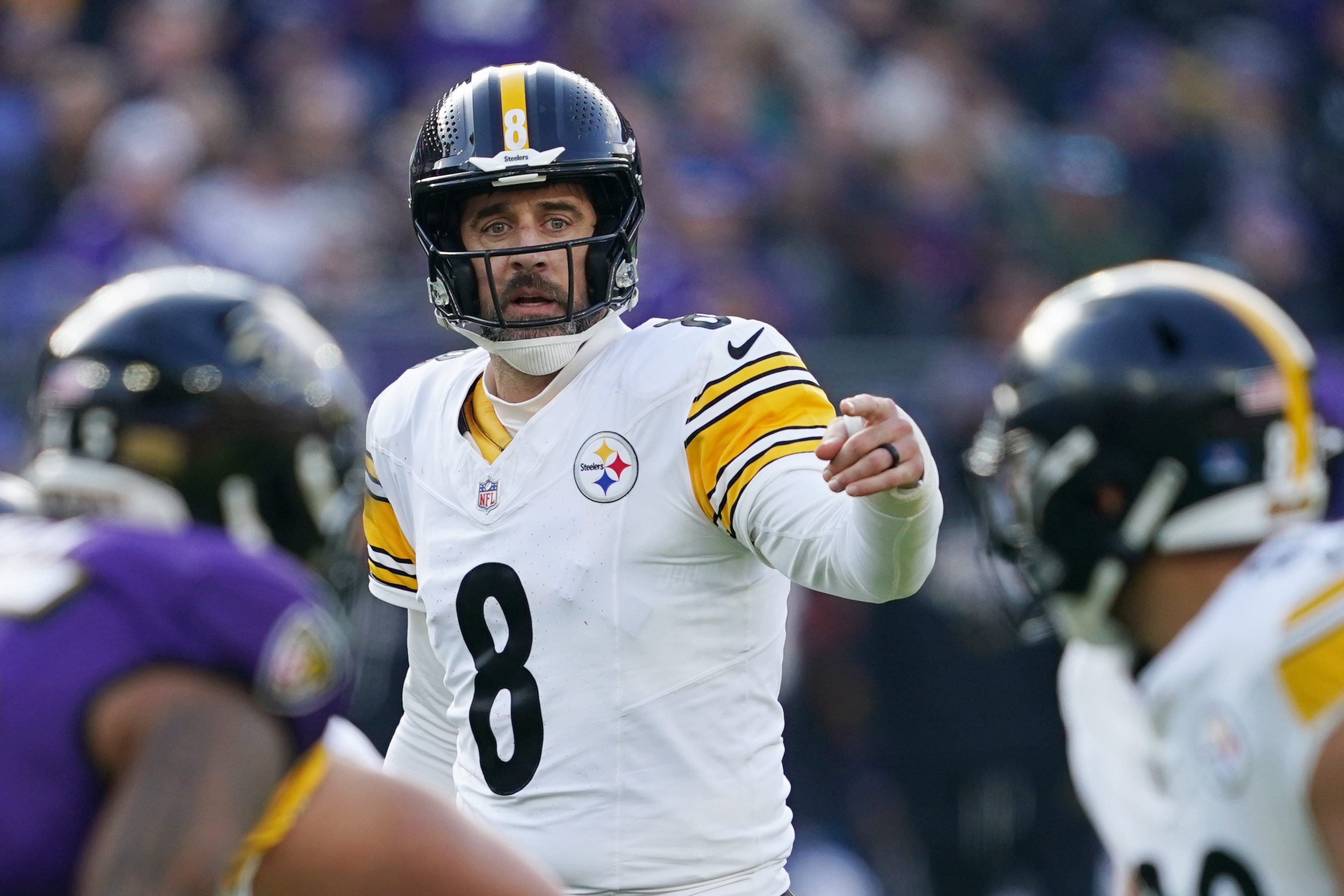 Pittsburgh Steelers quarterback Aaron Rodgers (8) calls a play as we break down our Ravens vs. Steelers predictions for Sunday Night Football.