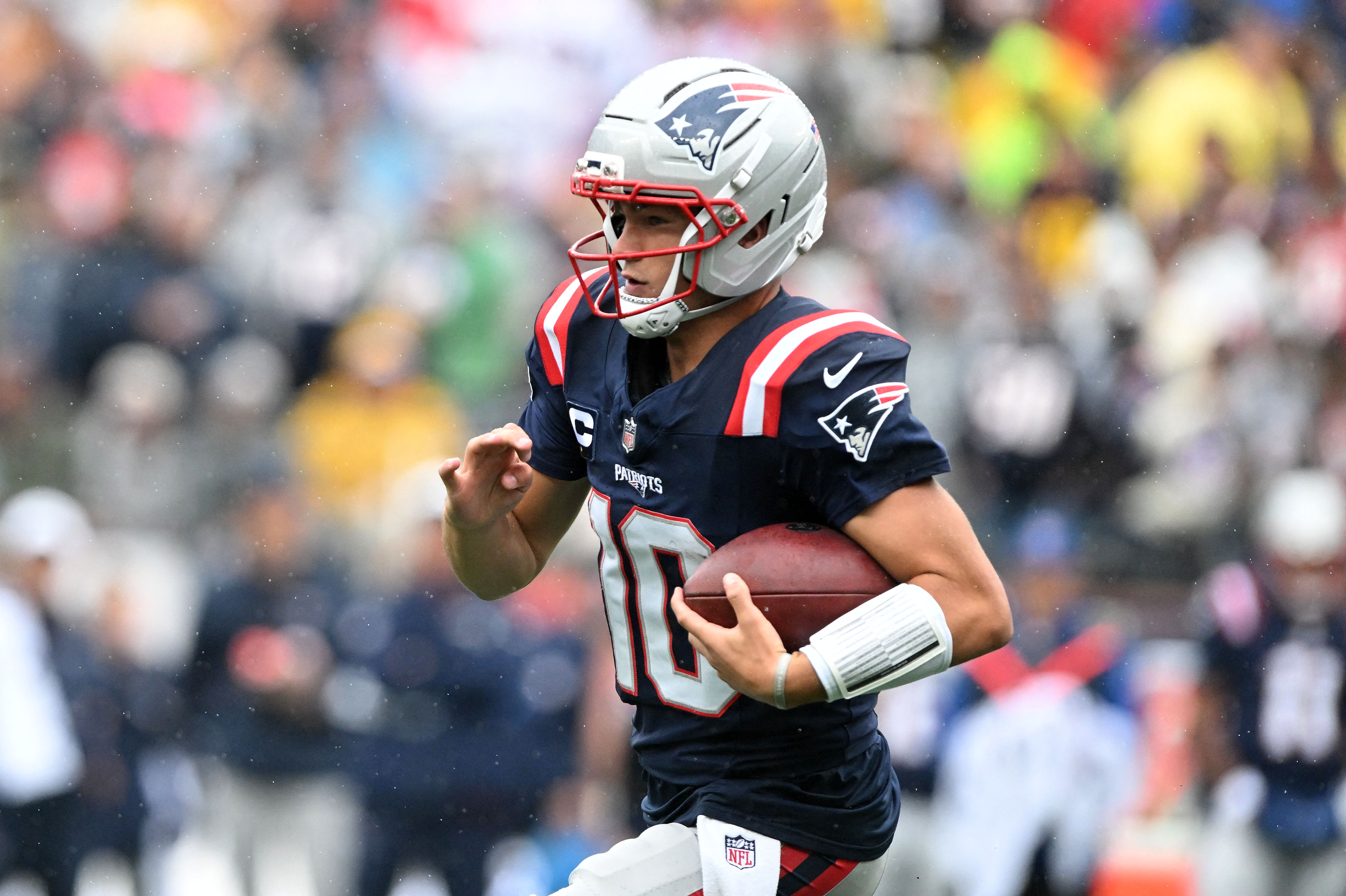 New England Patriots quarterback Drake Maye (10), seen here rushing the ball, is featured in our 2026 Super Bowl same game parlay for the Patriots to win.