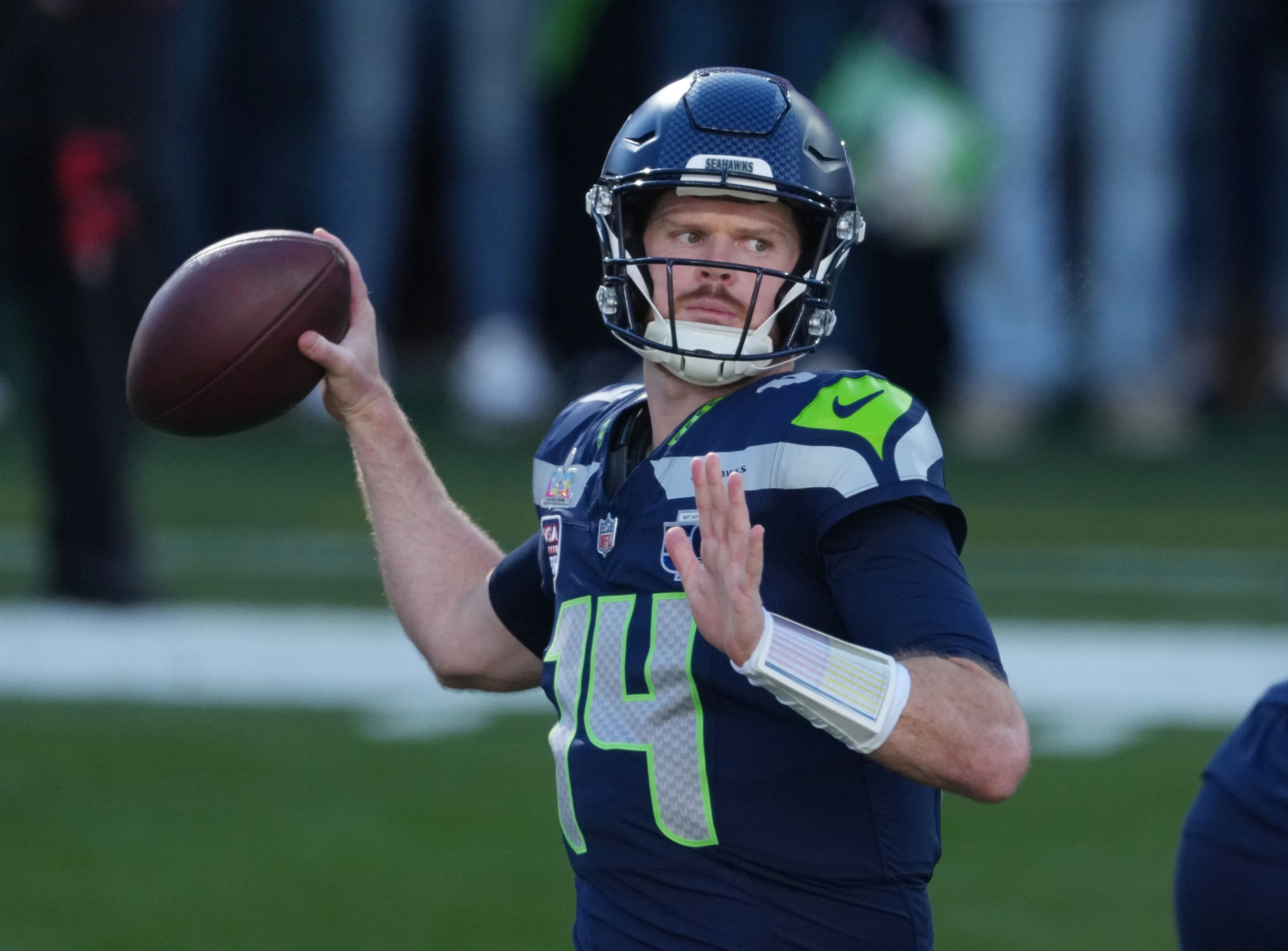 Seattle Seahawks quarterback Sam Darnold throws, and we're look at the Super Bowl props.