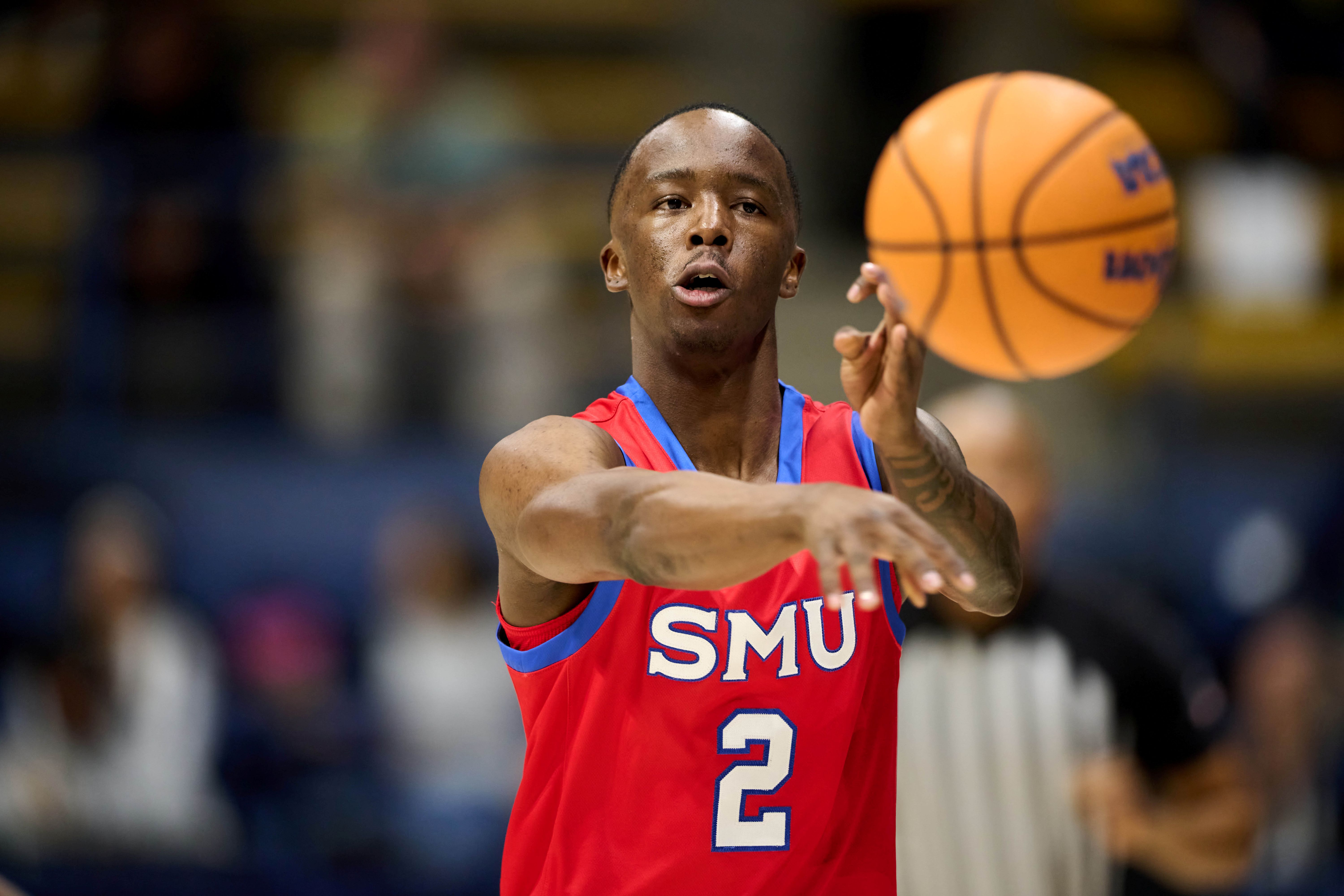 SMU Mustangs guard Boopie Miller passes the ball as we make our best Miami (OH) vs. SMU prediction.
