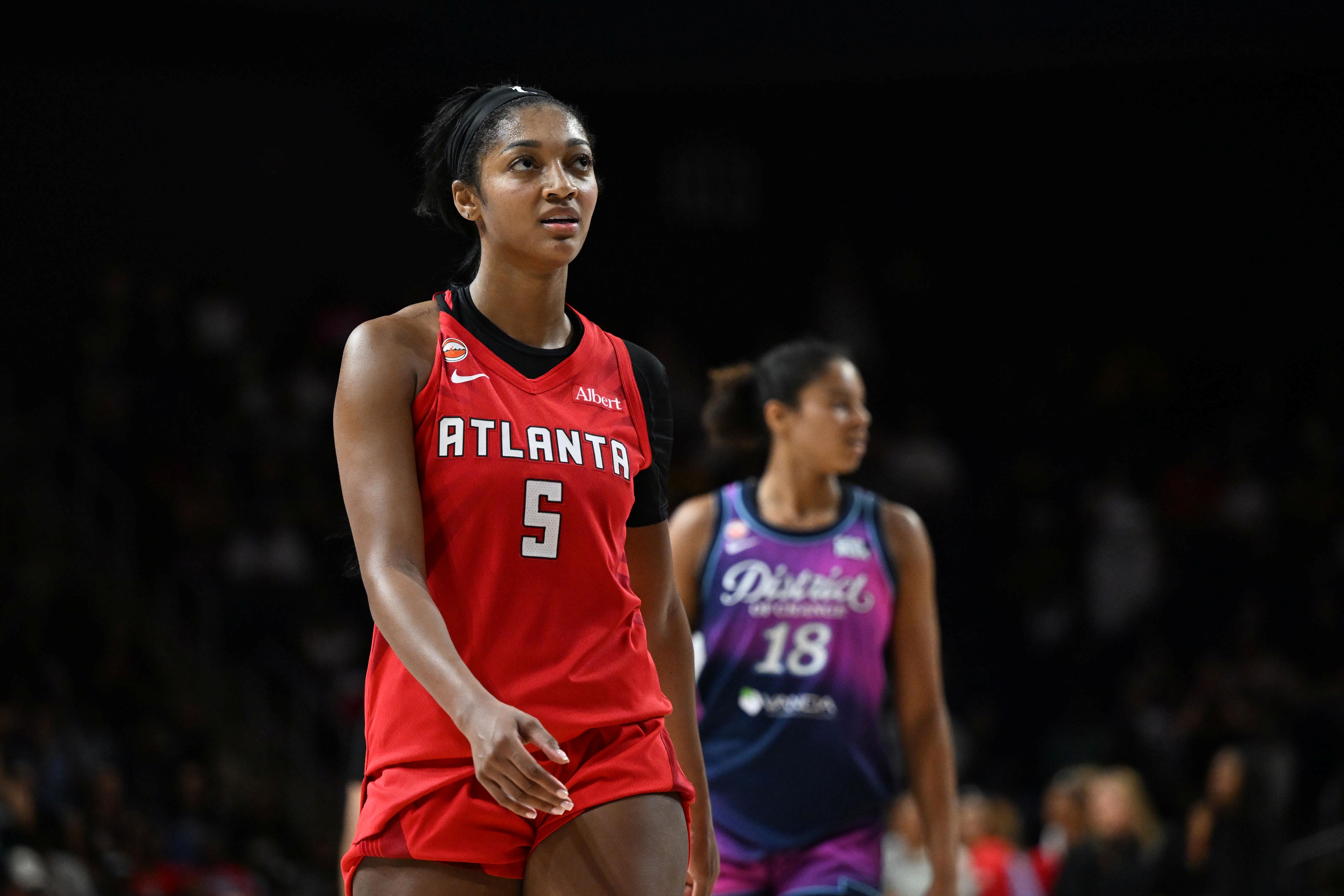 Dream forward Angel Reese (5) looks on as we break down our Mystics vs. Dream prediction.