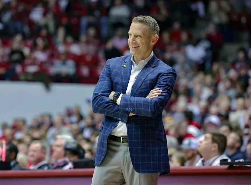 Head coach Nate Oats of the Alabama Crimson Tide smiles after a foul call as we look at the latest 2024 SEC title odds.