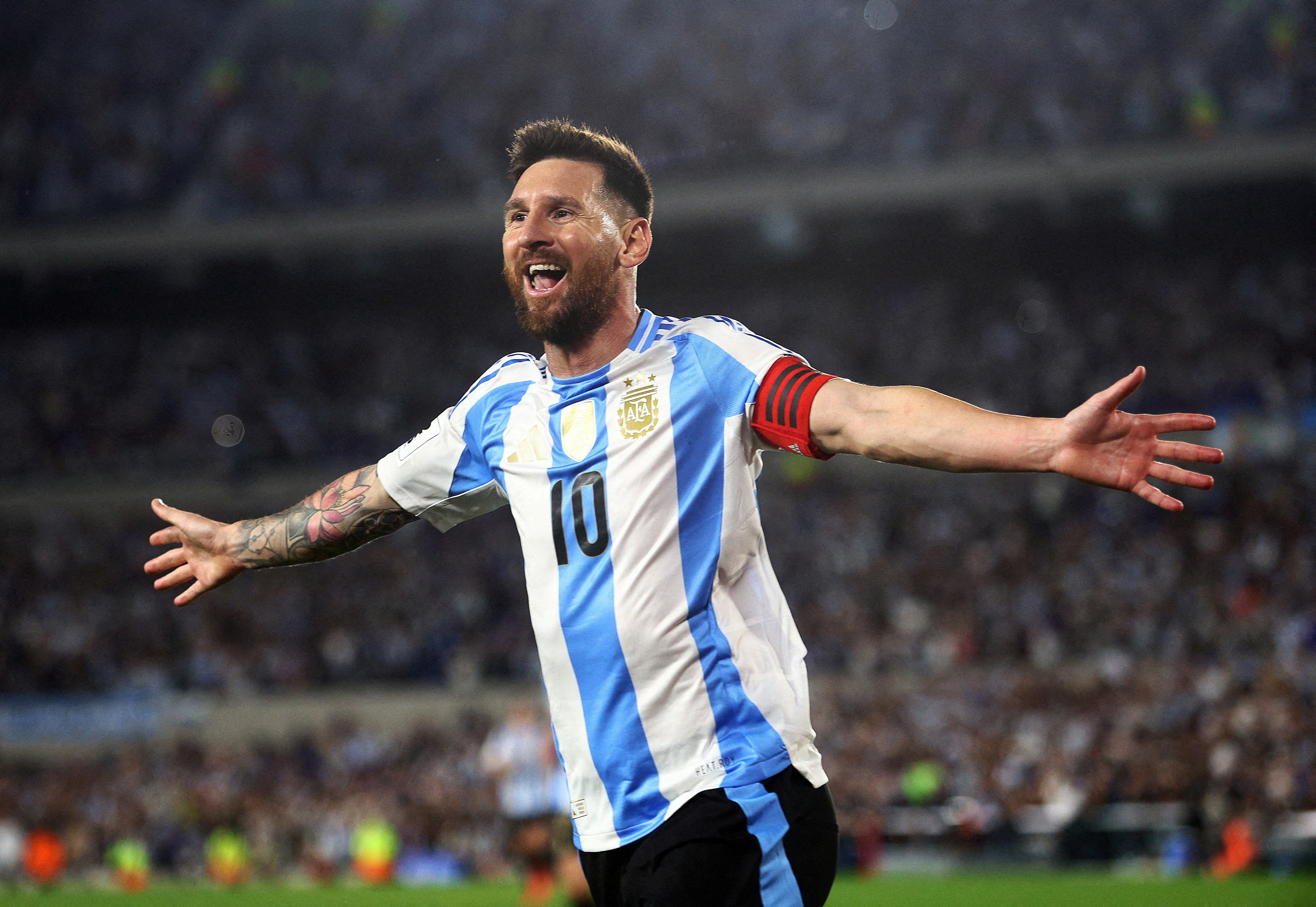 Argentina's Lionel Messi celebrates as we make our best Messi World Cup predictions today. 
