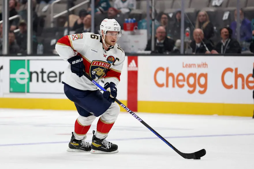 Florida Panthers center Aleksander Barkov skates with the puck against the San Jose Sharks.