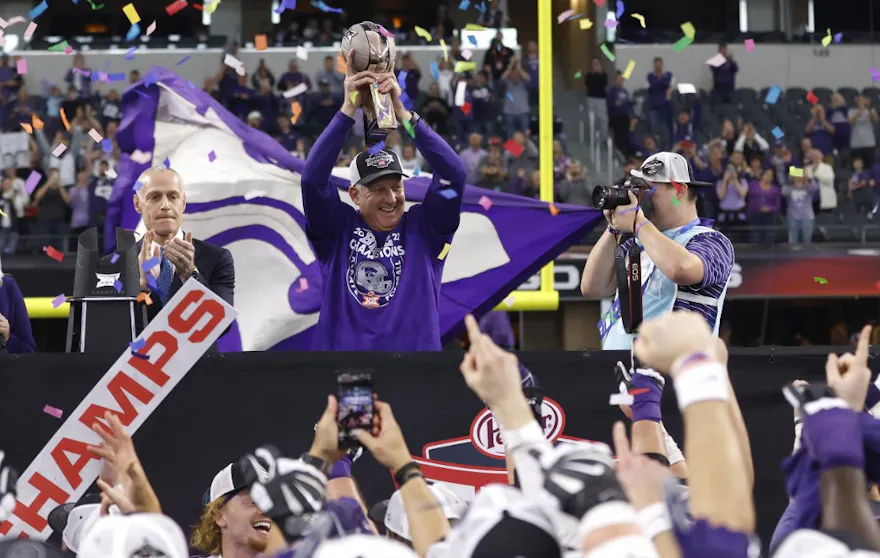 Head coach Chris Klieman of the Kansas State Wildcats celebrates a Big 12 Football Championship as look at the 2024 conference odds.