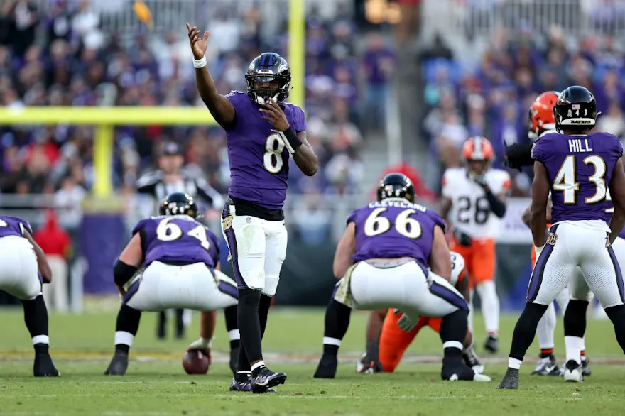 Lamar Jackson #8 of the Baltimore Ravens reacts after a delay of game penalty as we look at our Bengals vs. Ravens prediction