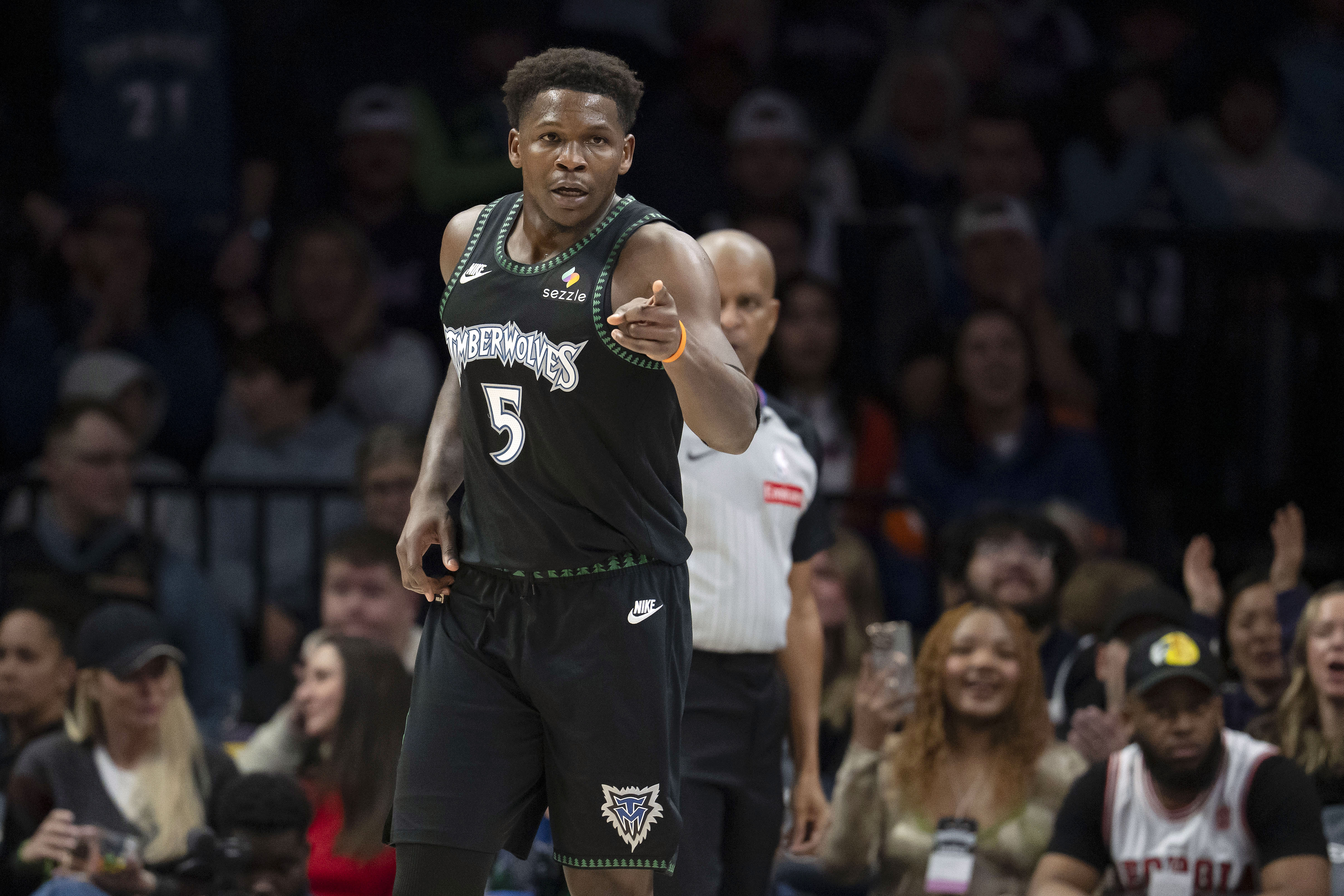 Minnesota Timberwolves guard Anthony Edwards (5) points after making a shot as he is featured in our Anthony Edwards player prop picks for NBA Christmas Day.