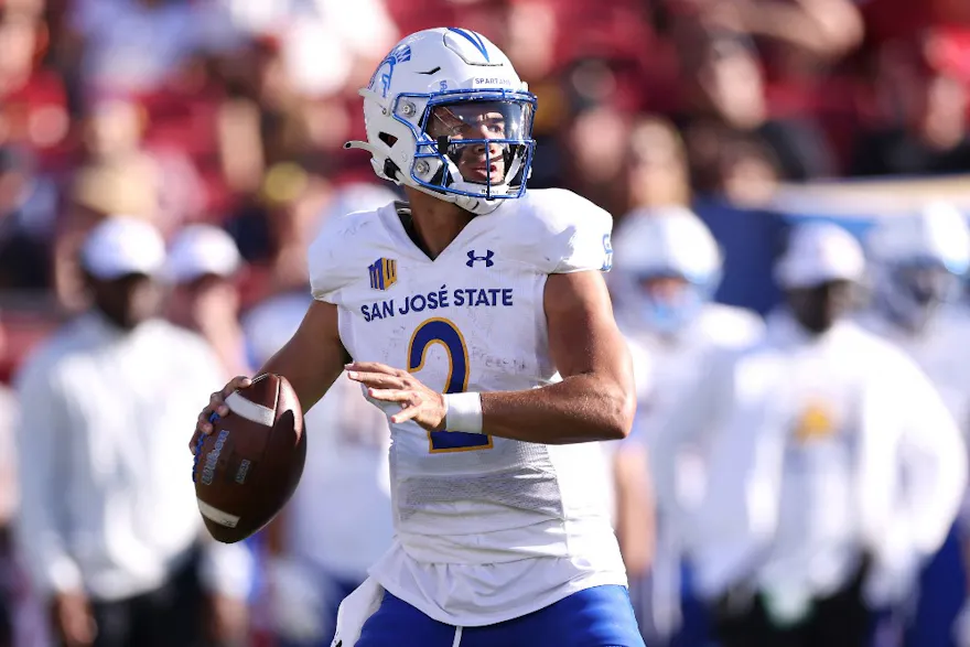 Chevan Cordeiro of the San Jose State Spartans passes the ball during the first quarter as we share our top college football expert picks.