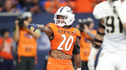 UTSA Roadrunners running back Robert Henry celebrates after a touchdown as we make our best Tulane vs. UTSA prediction