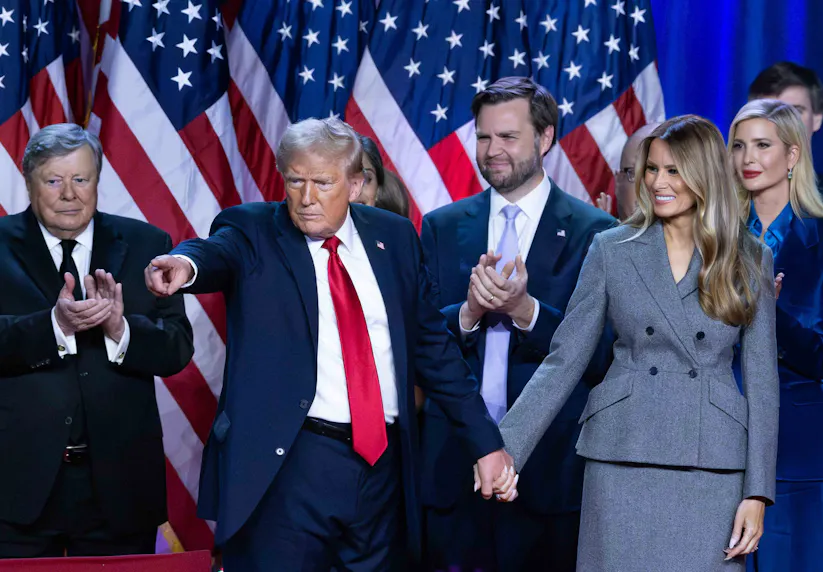Donald Trump holds hands with wife Melania as we look at the news surrounding Polymarket.