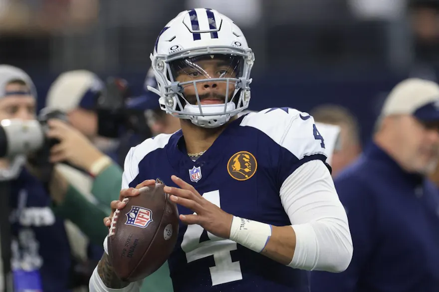 Dak Prescott of the Dallas Cowboys warms up prior to the game against the Washington Commanders as we look at our BetMGM promo code for Seahawks-Cowboys.