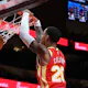 John Collins of the Atlanta Hawks dunks against the Detroit Pistons but is among our picks to be dealt at the NBA trade deadline