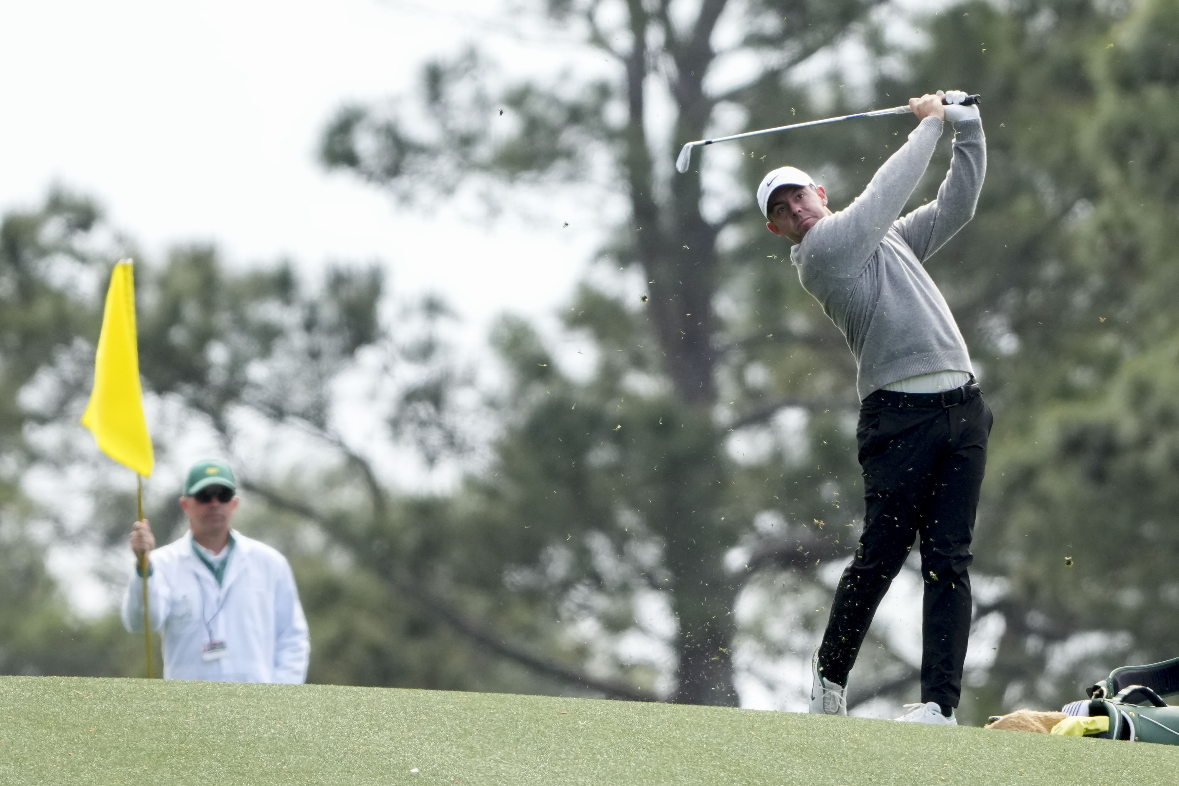 Rory McIlroy hits from the 15th fairway during a practice round for the Masters Tournament at Augusta National Golf Club.